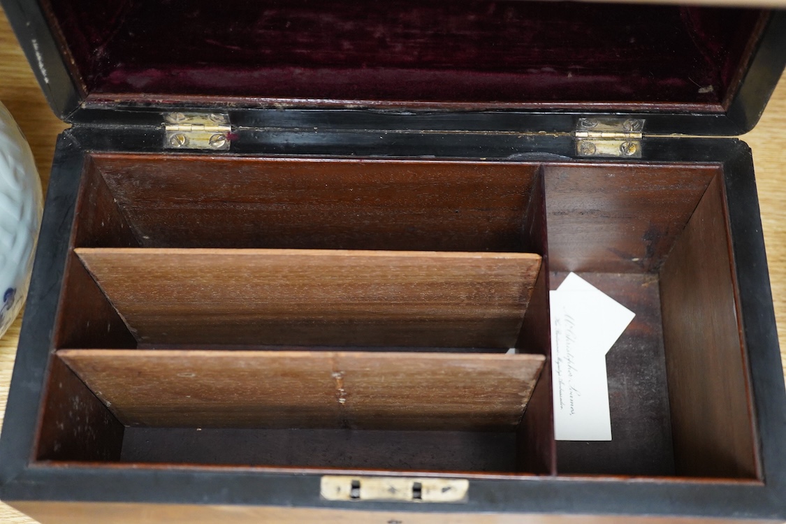 A George III and later flame mahogany veneered writing box raised on ball feet, 30cm wide